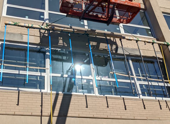 Hightower Labs conducting ASTM E1105 field testing for building envelope systems.