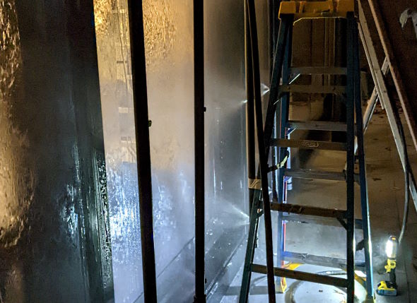 Hightower Labs conducting a building envelope water resistivity assessment.